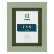 Green 9 x 7 inch picture frame with a green mount for a 7 x 5 inch photo