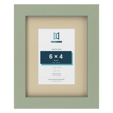 Green 9 x 7 inch picture frame with an ivory mount for a 6 x 4 inch photo