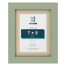 Green 9 x 7 inch picture frame with an ivory mount for a 7 x 5 inch photo