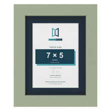 Green 9 x 7 inch picture frame with a Pacific Blue mount for a 7 x 5 inch photo