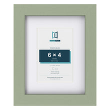 Green 9 x 7 inch picture frame with a white mount for a 6 x 4 inch photo