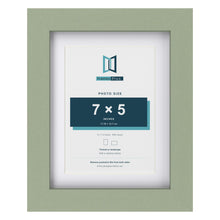 Green 9 x 7 inch picture frame with a white mount for a 7 x 5 inch photo