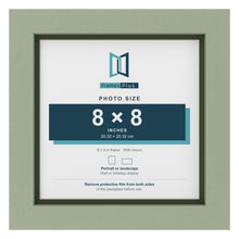 Green 9 x 9 inch picture frame with a green mount for an 8 x 8 inch photo