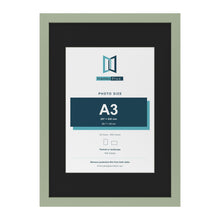Green A2 picture frame with a black mount for an A3 photo