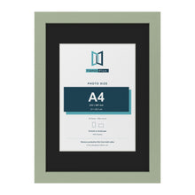 Green A3 picture frame with a black mount for an A4 photo