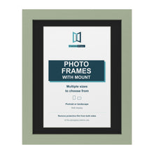 Green picture frame with a black mount