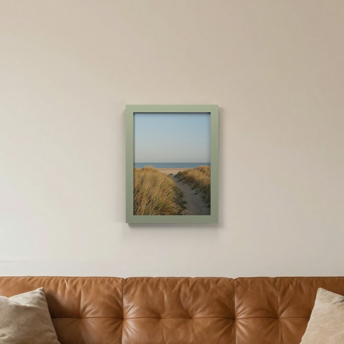 Green picture frame hanging on a living room wall