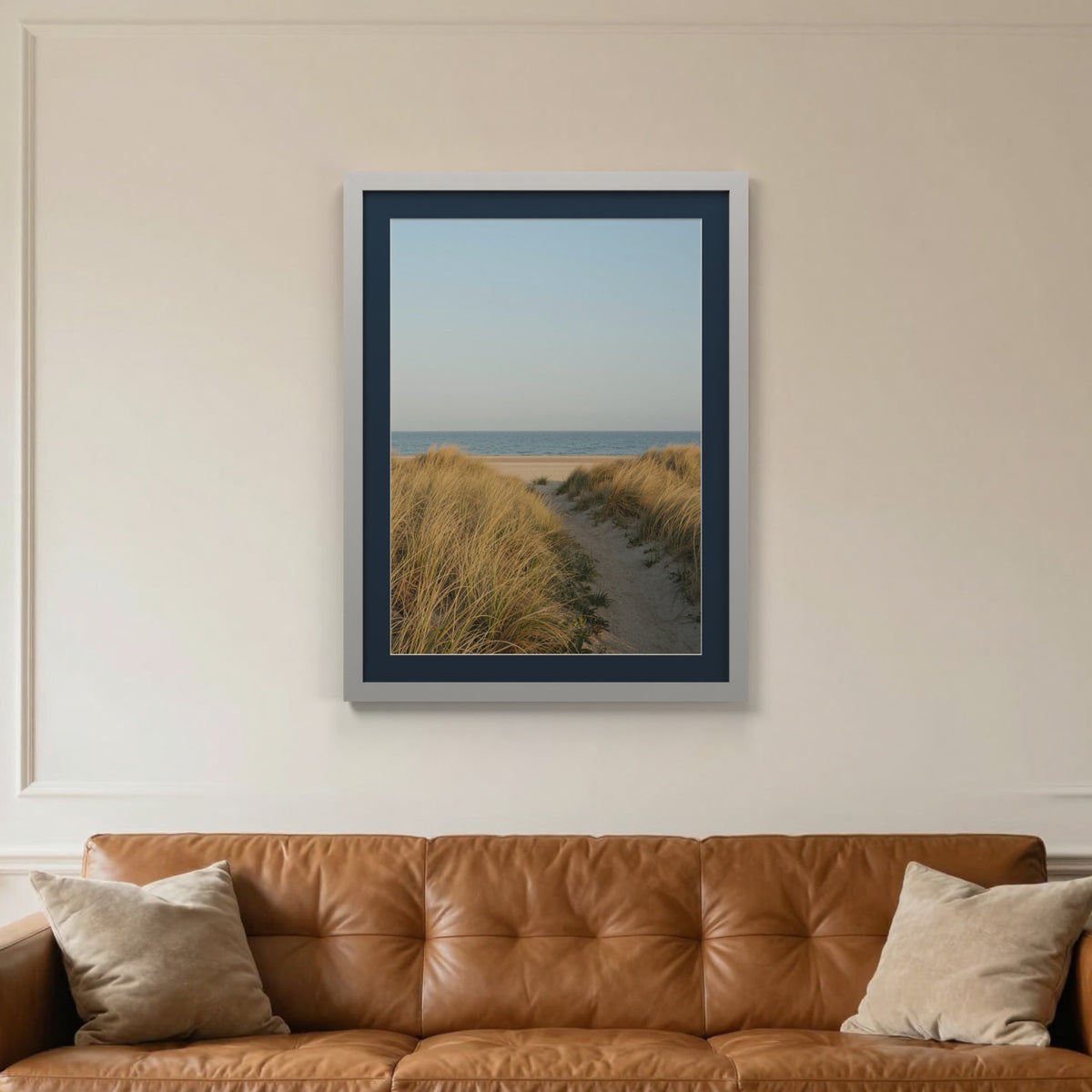 Light Grey picture frame with a Pacific Blue mount hanging on a living room wall