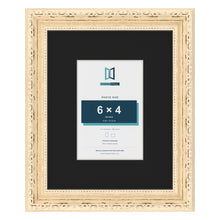 Louis Cream 10 x 8 inch picture frame with a black mount for a 6 x 4 inch photo