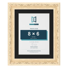 Louis Cream 10 x 8 inch picture frame with a black mount for an 8 x 6 inch photo