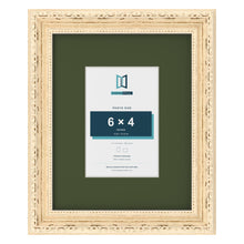 Louis Cream 10 x 8 inch picture frame with a green mount for a 6 x 4 inch photo