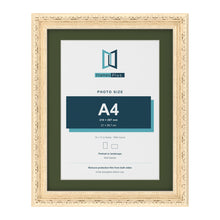 Louis Cream 14 x 11 inch picture frame with a green mount for an A4 photo