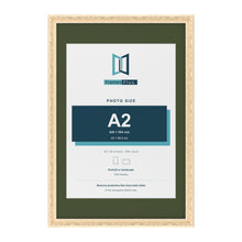 Louis Cream 30 x 20 inch picture frame with a green mount for an A2 photo