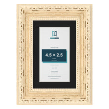 Louis Cream 6 x 4 inch picture frame with a black mount for a 4.5 x 2.5 inch photo