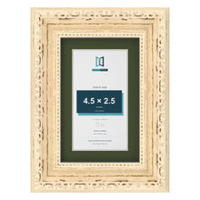 Louis Cream 6 x 4 inch picture frame with a green mount for a 4.5 x 2.5 inch photo
