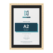 Louis Cream 70 x 50 cm picture frame with a black mount for an A2 photo