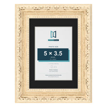 Louis Cream 7 x 5 inch picture frame with a black mount for a 5 x 3.5 inch photo