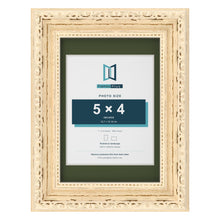 Louis Cream 7 x 5 inch picture frame with a green mount for a 5 x 4 inch photo