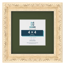 Louis Cream 7 x 7 inch picture frame with a green mount for a 4 x 4 inch photo