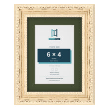 Louis Cream 8 x 6 inch picture frame with a green mount for a 6 x 4 inch photo