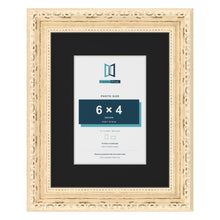 Louis Cream 9 x 7 inch picture frame with a black mount for a 6 x 4 inch photo
