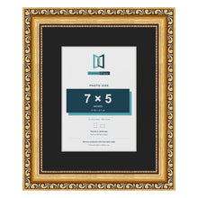 Louis Gold 10 x 8 inch picture frame with a black mount for a 7 x 5 inch photo