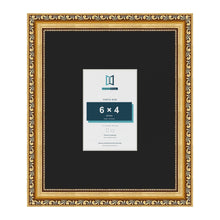 Louis Gold 12 x 10 inch picture frame with a black mount for a 6 x 4 inch photo
