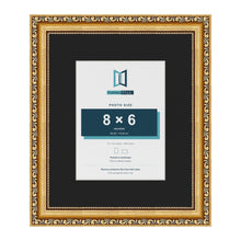 Louis Gold 12 x 10 inch picture frame with a black mount for an 8 x 6 inch photo