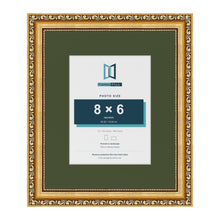 Louis Gold 12 x 10 inch picture frame with a green mount for an 8 x 6 inch photo