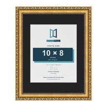Louis Gold 14 x 11 inch picture frame with a black mount for a 10 x 8 inch photo