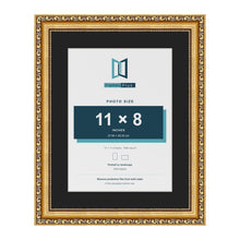 Louis Gold 14 x 11 inch picture frame with a black mount for an 11 x 8 inch photo