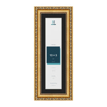 Louis Gold 15 x 5 inch picture frame with a black mount for a 13 x 3 inch photo