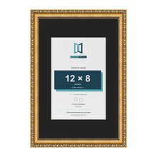Louis Gold 18 x 12 inch picture frame with a black mount for a 12 x 8 inch photo