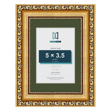 Louis Gold 7 x 5 inch picture frame with a green mount for a 5 x 3.5 inch photo