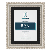 Louis Silver 10 x 8 inch picture frame with a black mount for an 8 x 6 inch photo