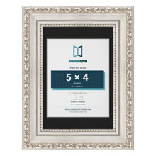 Louis Silver 7 x 5 inch picture frame with a black mount for a 5 x 4 inch photo