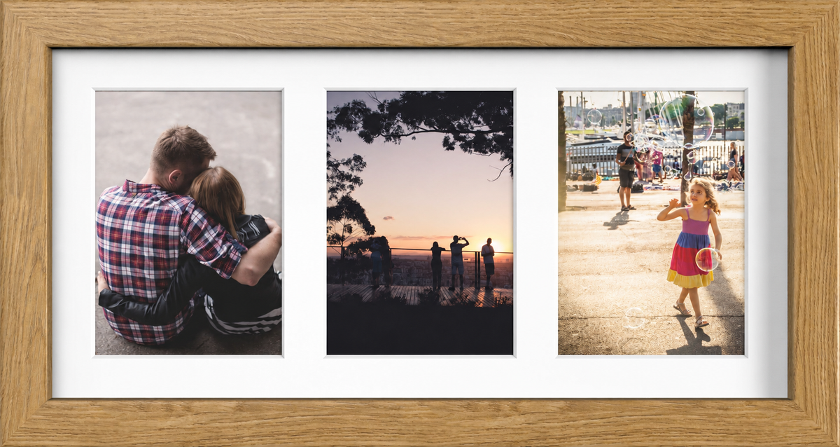 Oak Multi-Aperture Frame for 3 Photos 7x5" with White Mount displaying photographs