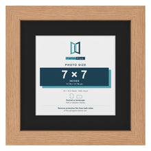 Oak 10 x 10 inch picture frame with a black mount for a 7 x 7 inch photo