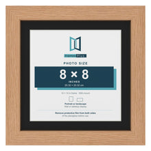 Oak 10 x 10 inch picture frame with a black mount for an 8 x 8 inch photo