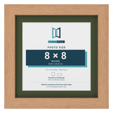 Oak 10 x 10 inch picture frame with a green mount for an 8 x 8 inch photo