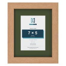 Oak 10 x 8 inch picture frame with a green mount for a 7 x 5 inch photo