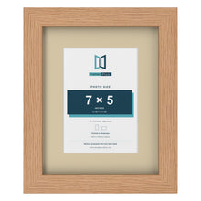 Oak 10 x 8 inch picture frame with an ivory mount for a 7 x 5 inch photo