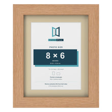 Oak 10 x 8 inch picture frame with an ivory mount for an 8 x 6 inch photo