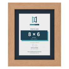 Oak 10 x 8 inch picture frame with a Pacific Blue mount for an 8 x 6 inch photo