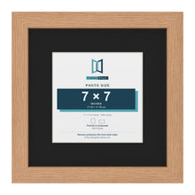 Oak 11 x 11 inch picture frame with a black mount for a 7 x 7 inch photo