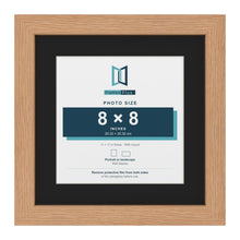Oak 11 x 11 inch picture frame with a black mount for an 8 x 8 inch photo