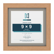 Oak 11 x 11 inch picture frame with a Dawn Grey mount for a 9 x 9 inch photo