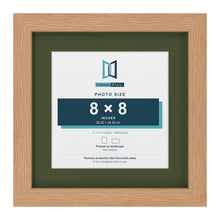 Oak 11 x 11 inch picture frame with a green mount for an 8 x 8 inch photo