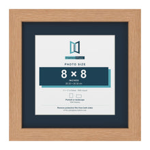 Oak 11 x 11 inch picture frame with a Pacific Blue mount for an 8 x 8 inch photo