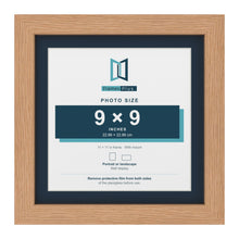 Oak 11 x 11 inch picture frame with a Pacific Blue mount for a 9 x 9 inch photo